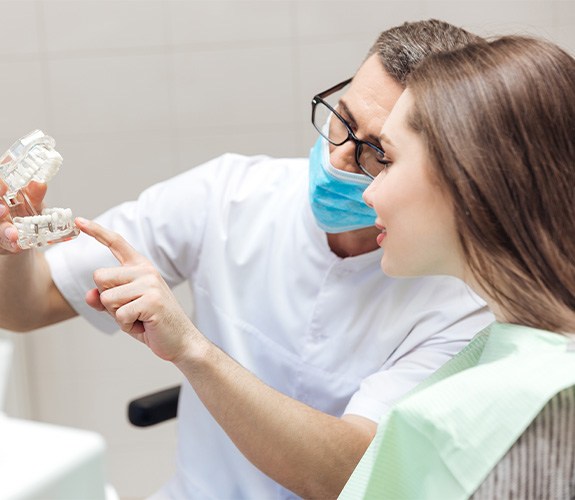 Dental implant consultation between patient and dentist 