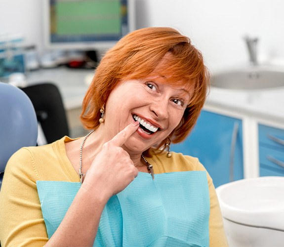 Woman pleased with her new dental implants