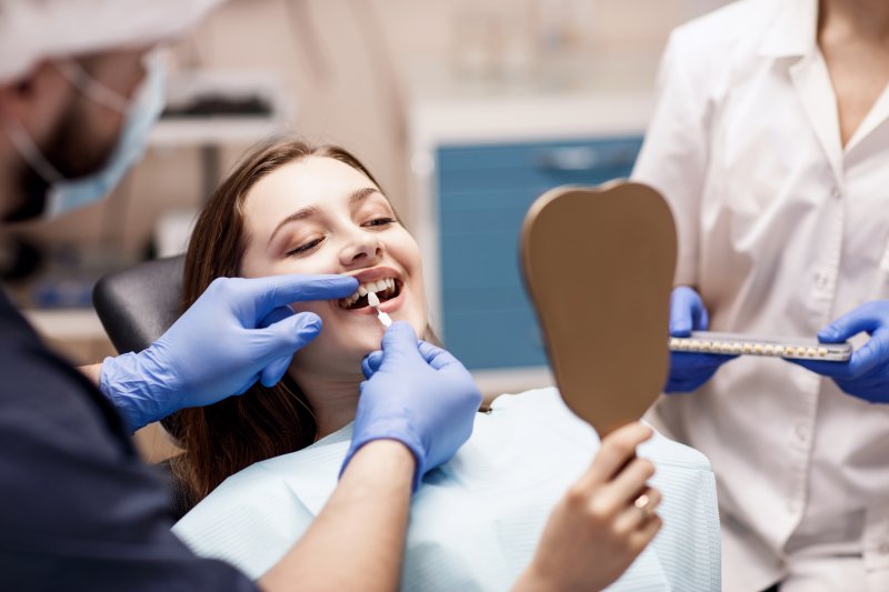 woman preparing for cosmetic dentistry